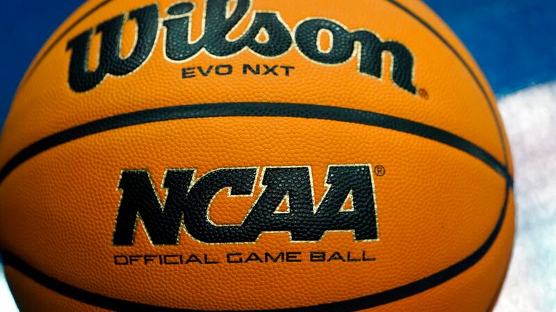 One of the official basketballs sets on the court during first round practice NCAA men's...
