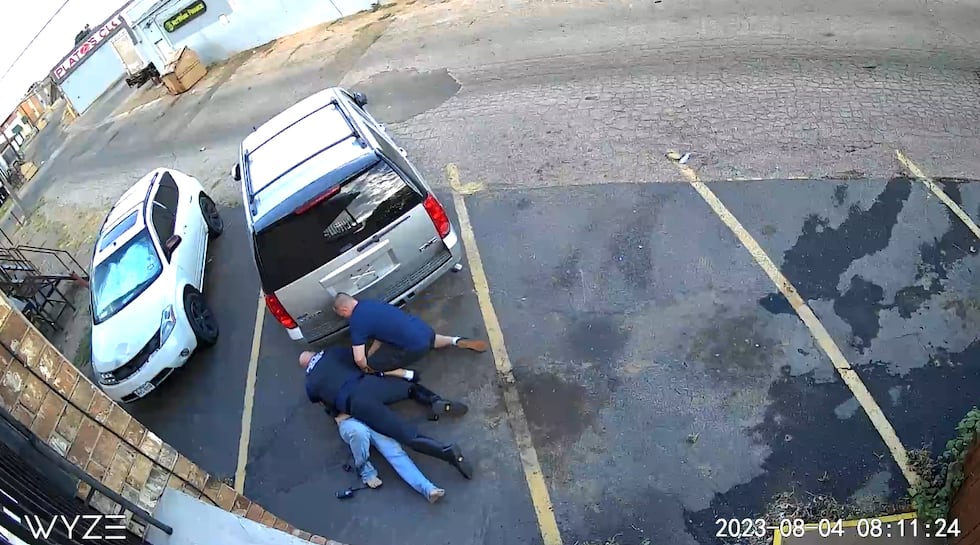 An APD officer chased down a suspect and the suspect tried to reach for his gun.